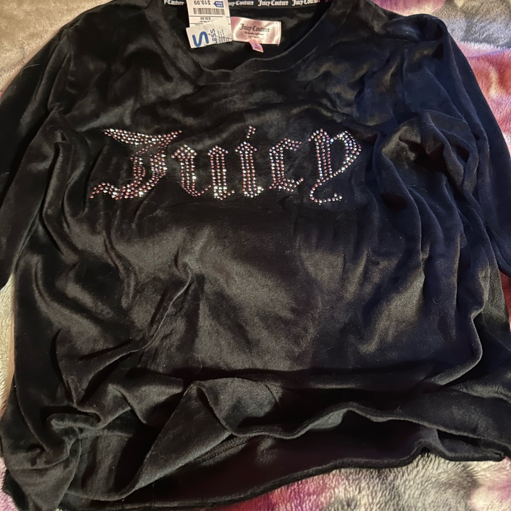 It’s a brand new juicy shirt never worn !!